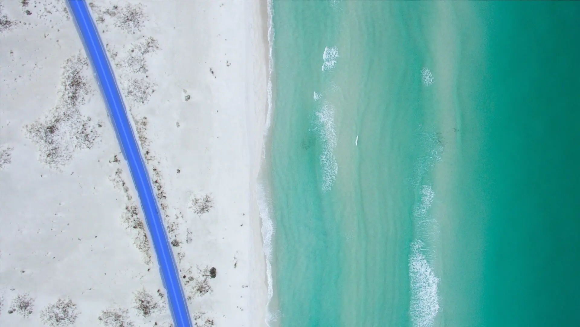 A white sand beach and the sea